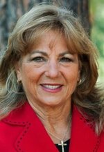 Sinda Hanson, Broker
